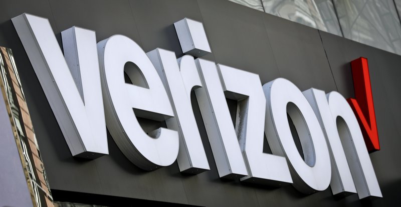 This May 2, 2017, file photo, shows Verizon corporate signage on a store in New York's Midtown.  (AP Photo/Bebeto Matthews, File)