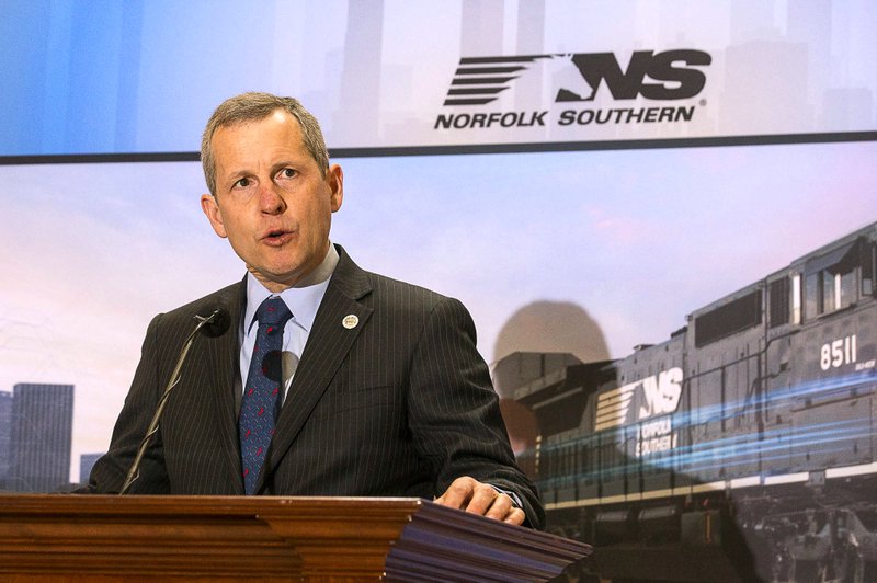 Norfolk Southern Company Chairman, President and CEO Jim Squires speaks during a press conference in the Georgia State Capitol building in Atlanta, Wednesday, December 12, 2018. Fortune 500 company Norfolk Southern officially announced Wednesday that they will be moving their headquarters to Atlanta. They will be building in Atlanta's Midtown community. (Alyssa Pointer/Atlanta Journal-Constitution via AP)