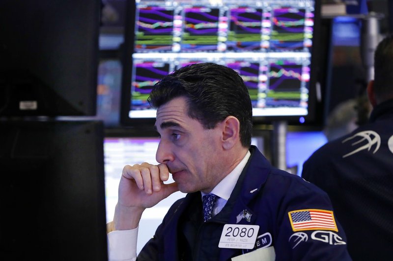 FILE- In this Dec. 6, 2018, file photo specialist Peter Mazza works at his post on the floor of the New York Stock Exchange. The U.S. stock market opens at 9:30 a.m. EST on Thursday, Dec. 13. (AP Photo/Richard Drew, File)