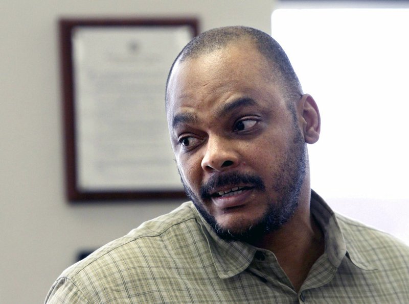 FILE - In this June 17, 2011 file photo Dorcus Allen addresses the court prior to his sentencing at the County-City Building in Tacoma, Wash. The Washington Supreme Court has ruled that Allen, who drove Lakewood police killer Maurice Clemmons to and from the scene where he gunned down four officers in 2009, will not face aggravated murder charges at his retrial. At his first trial, jurors convicted Allen of first-degree murder, but they did not find him guilty of aggravating factors that would lead to an automatic sentence of life in prison without release. (Janet Jensen/The News Tribune via AP, File)