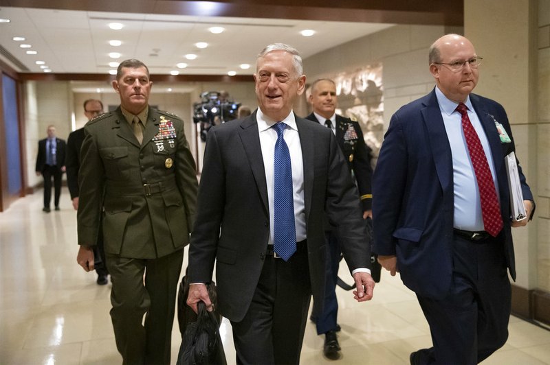 Secretary of Defense Jim Mattis arrives to give House members a classified security briefing, with Secretary of State Mike Pompeo, not shown, on the murder of Jamal Khashoggi and Saudi Arabia's war in Yemen, on Capitol Hill in Washington, Thursday, Dec. 13, 2018. (AP Photo/J. Scott Applewhite)