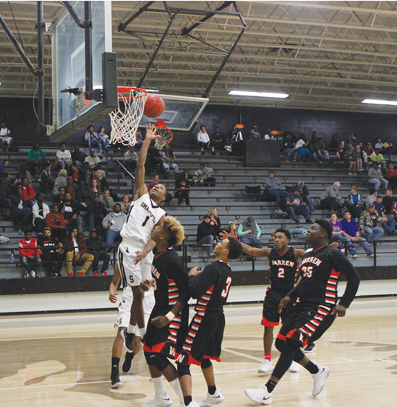 Terrance Armstard/News-Times  In this file photo, Smackover's Jaqueze Modica goes up for a layup during a game against Warren during the 2017-18 season. A junior, Modica will be a key figure for the Bucks this season. Heading into tonight's 7-3A conference game at Ashdown, Smackover holds a 1-3 record overall with a 1-0 mark in league play.