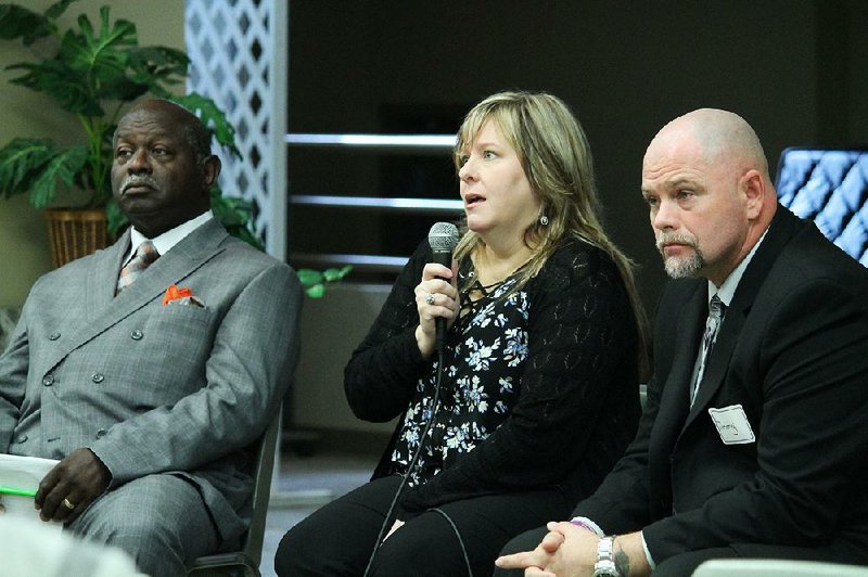 Suzanne Tipton (center) speaks to faith leaders as a panel member at the Interfaith Arkansas annual gathering “Faith Community Responds to the Opioid Epidemic,” along with the Rev. William Gibbons (left), a discipleship pastor at St. John Missionary Baptist Church; and Jimmy McGill, a substance abuse peer recovery specialist, on Nov. 8 at Second Baptist Church in Little Rock. Along with the state Health Department and the Clinton Foundation, the faith community is partnering to combat the opioid epidemic in Arkansas.