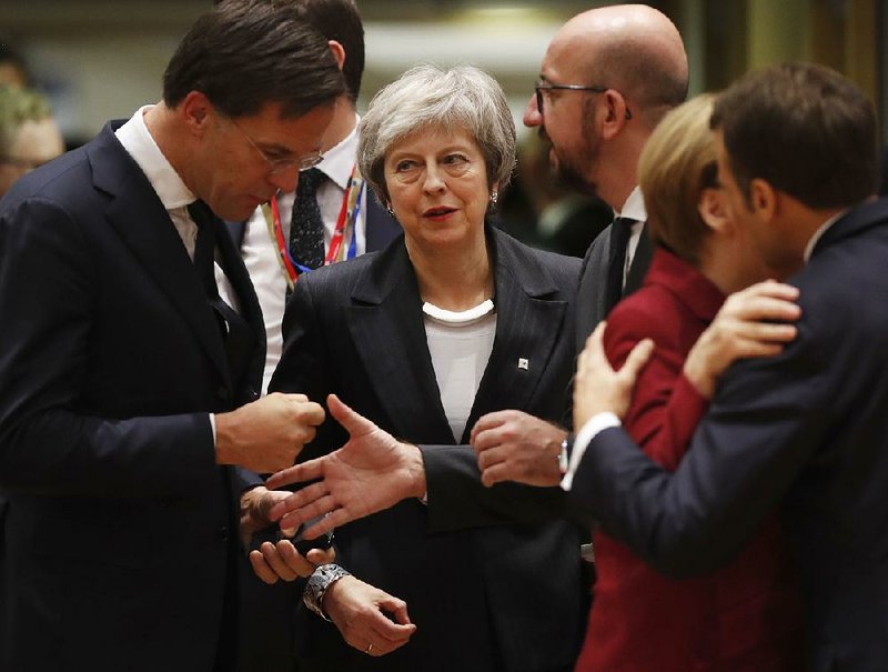 British Prime Minister Theresa May arrives for a round-table meeting Thursday at a European Union summit in Brussels. 