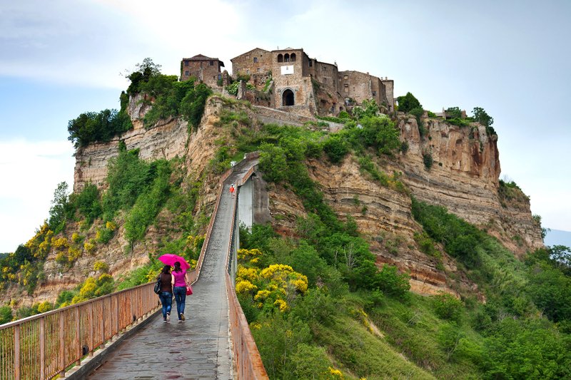 A footpath is all that connects Italy’s Civita di Bagnoregiocq JN to the “mainland.”