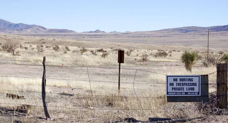 This Jan. 20, 2012, file photo, near Cloverdale in New Mexico's Bootheel region shows a gated part of the Diamond A Ranch and is 77 miles south of Lordsburg, N.M., the nearest U.S. Border Patrol station. A 7-year-old Guatemalan girl, picked up with her father and dozens of other migrants along the remote stretch of the U.S.-Mexico border, has died, federal officials said Friday, Dec. 14, 2018. (AP Photo/Russell Contreras, File)