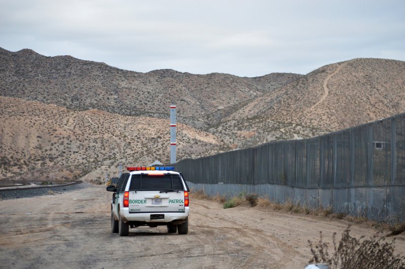 In this Jan. 4, 2016, file photo, a U.S. Border Patrol agent patrols Sunland Park along the U.S.-Mexico border next to Ciudad Juarez. A 7-year-old girl who had crossed the U.S.-Mexico border with her father, died after being taken into the custody of the U.S. Border Patrol, federal immigration authorities confirmed Thursday. (AP Photo/Russell Contreras, File)

