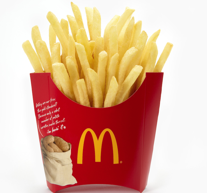 Six cheesy bacon fries with that? McDonald’s is expected to offer more fat with its fries.
