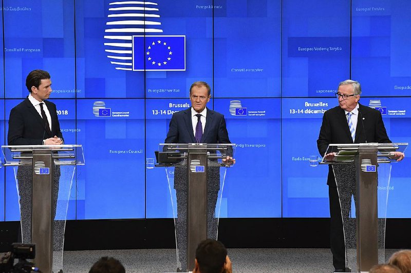 Austrian Chancellor Sebastian Kurz (from left), European Council President Donald Tusk and European Commission President Jean-Claude Juncker hold a news conference Friday in Brussels at the end of a European Union summit, where leaders voiced doubts on Britain’s deal to leave the bloc. 