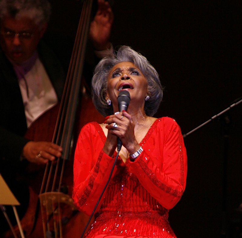 FILE - In this June 29, 2007 file photo, singer Nancy Wilson, performs at her Swingin' 70th Birthday Party at Carnegie Hall in New York. Grammy-winning jazz and pop singer Wilson has died at age 81. Her manager Devra Hall Levy tells The Associated Press late Thursday night, Dec. 13, 2018, that Wilson died peacefully after a long illness at her home in Pioneertown, a California desert community near Joshua Tree National Park. (AP Photo/Rick Maiman, File)
