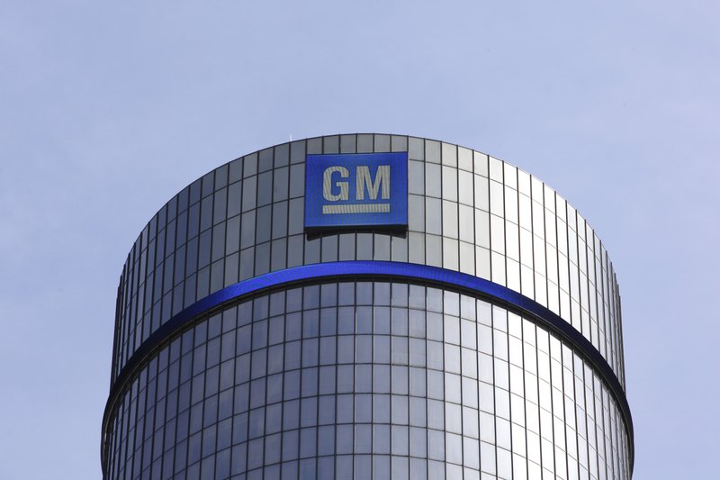 FILE - This May 5, 2011 file photo shows General Motors headquarters in Detroit. The General Motors' massive 14,000-person layoff announced last Nov. 2018 might not be as bad as originally projected. The company said Friday, Dec. 14, 2018, that 2,700 out of the 3,300 factory jobs slated for elimination will now be saved by adding jobs at other U.S. factories. Blue-collar workers in many cities will still lose jobs when GM shutters four U.S. factories next year. But most could find employment at other GM plants. Some would have to relocate. (AP Photo/Paul Sancya, File)