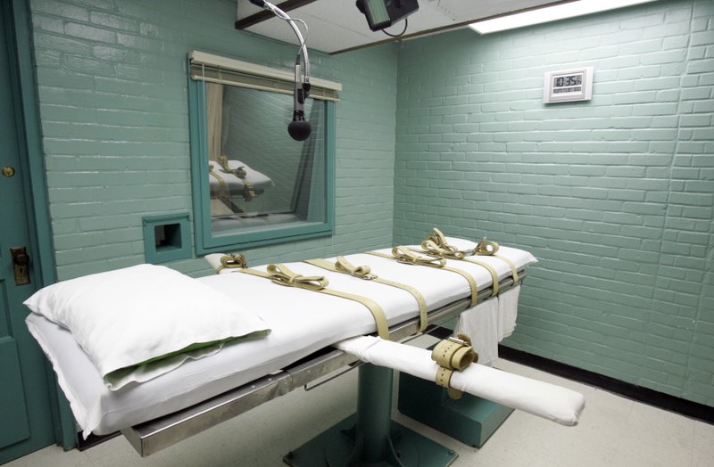 FILE - This May 27, 2008, file photo, shows the gurney in the death chamber in Huntsville, Texas. Three states resumed executions of death row inmates in 2018 after long breaks, but nationwide, executions remained near historic lows this year, according to an annual report on the death penalty released Friday, Dec. 14, 2018.(AP Photo/Pat Sullivan, File)