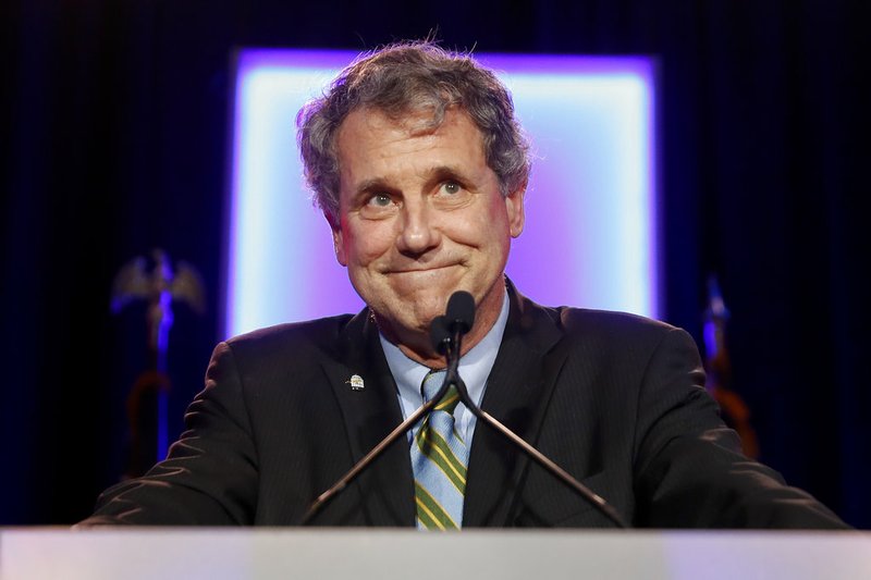 In this Nov. 6, 2018, file photo, Sen. Sherrod Brown, D-Ohio, speaks to supporters after winning re-election during the Democratic election night party in Columbus, Ohio. Brown plans an online town hall Sunday, Dec. 16 as he considers running for president in 2020. (AP Photo/John Minchillo, File)