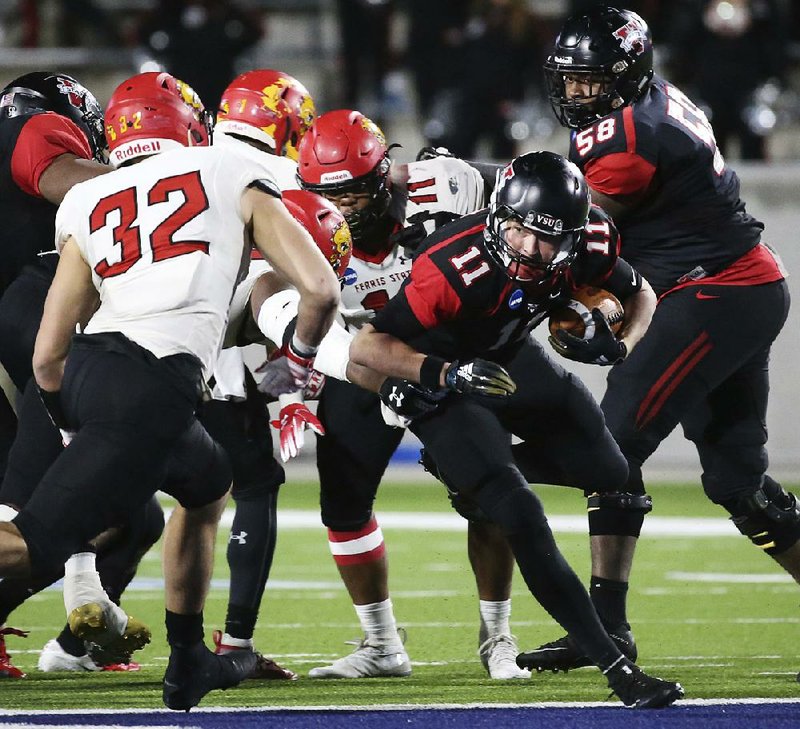 Valdosta State quarterback Rogan Wells (11) threw for 349 yards and ran for 39 more to lead the Blazers to a 49-47 victory over Ferris State for the NCAA Division II national championship Saturday in McKinney, Texas.
