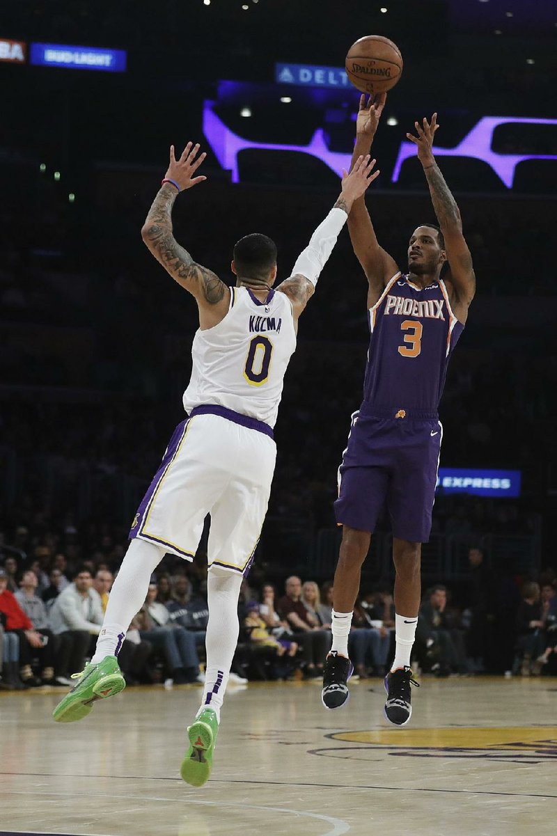 Trevor Ariza was traded by the Phoenix Suns to the Washington Wizards on Saturday after a potential three-team deal fell through Friday night.