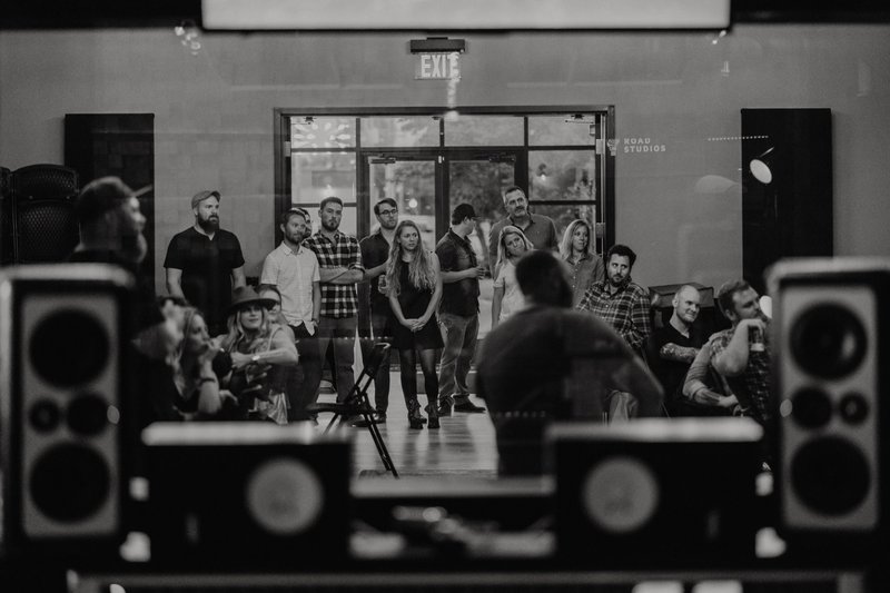 Courtesy photo Participating musicians and other folks gather at Haxton Road Studios in Bentonville for a listening party after the completion of the first record, "Bike Rack Records: Volume 1."