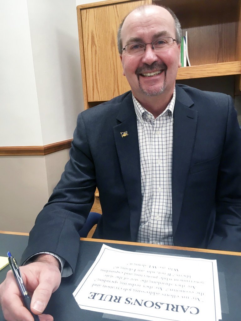 In this Nov. 29, 2018 photo, Republican House Majority Leader Chet Pollert poses for a photograph at the state Capitol in Bismarck, N.D. He succeeds longtime Fargo Rep. Al Carlson, who lost his re-election bid last month. Pollert has spent two decades in the Legislature but is low-key and little-known outside political circles. (AP Photo/James MacPherson)