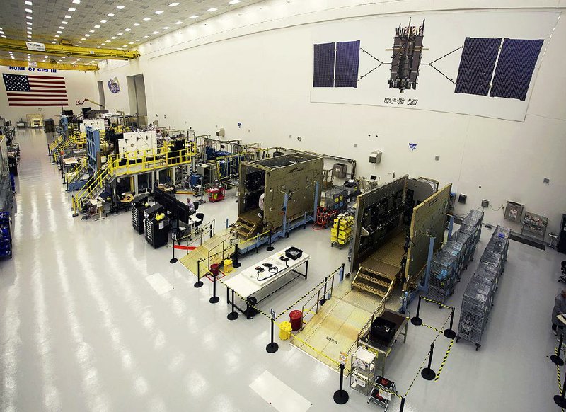This Sept. 2, 2016 photo shows GPS III satellites being built at Lockheed Martin’s complex south of Denver. The first GPS III satellite is scheduled to be launched Tuesday from Cape Canaveral, Fla. 