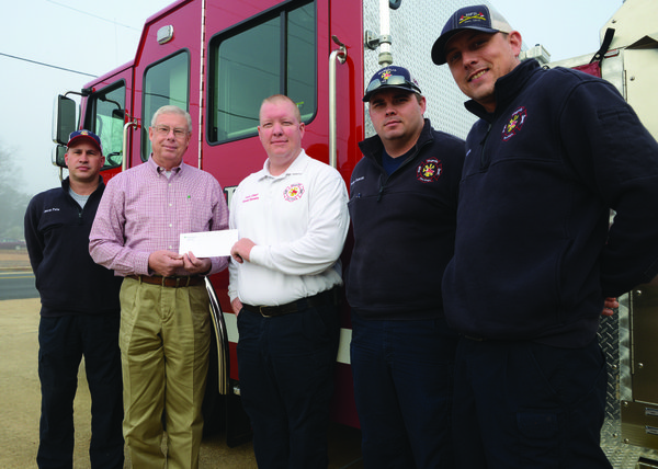 Weyerhaeuser donates to MFD, Library | Magnolia Banner News