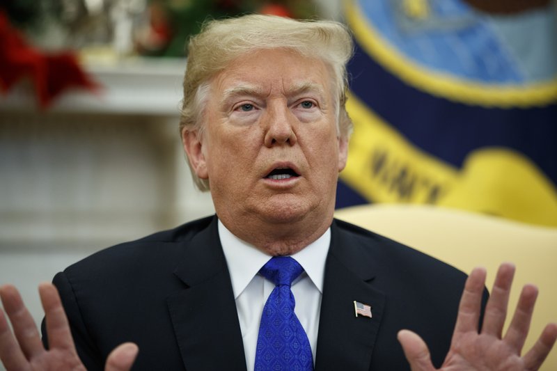 In this Dec. 11 photo, President Donald Trump speaks during a meets with Democratic leaders the Oval Office in Washington. Trump said last week he would be "proud" to have a shutdown to get Congress to approve a $5 billion down payment to fulfill his campaign promise to build a border wall. (AP Photo/Evan Vucci)

