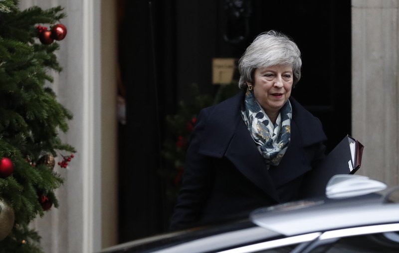 Britain's Prime Minister Theresa May leaves 10 Downing Street, in London on Monday for the House of Commons to make a statement on the EU Summit held recently in Brussels. (AP Photo/Alastair Grant)

