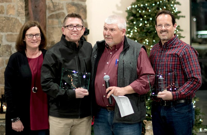 Bud Sullins/Special to the Herald-Leader Don and Deondra Chamberlain presented the Dustin's Dream Champion Award to Tim Jackson and Michael Houston during the evening. Pictured, from left, is Deondra Chamberlain, Tim Jackson, Don Chamberlain and Michael Houston.