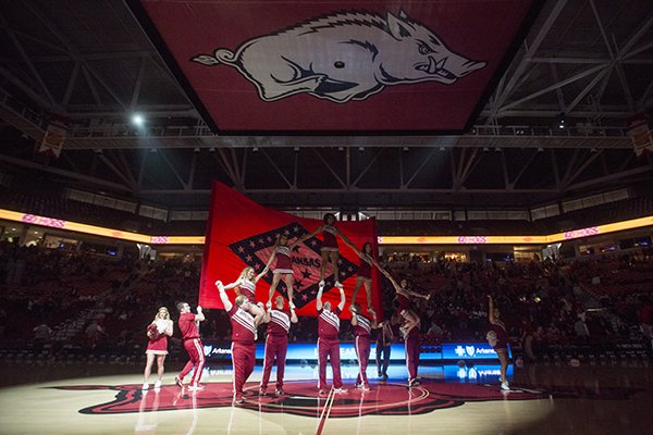 Arkansas cheerleaders perform during a timeout of a game between the Razorbacks and Western Kentucky on Saturday, Dec. 8, 2018, in Fayetteville. 