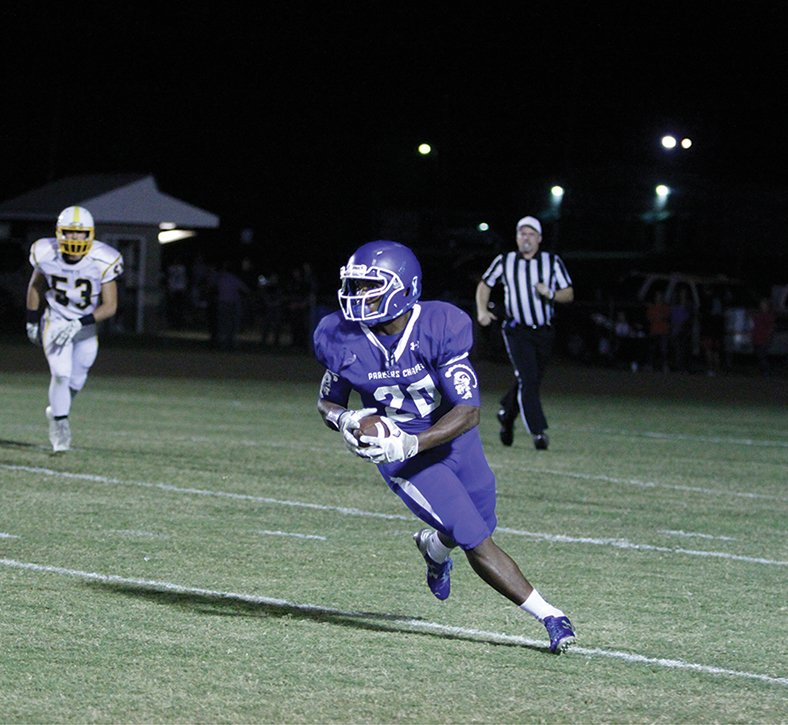 Terrance Armstard/News-Times In this file photo, Parkers Chapel's Dezmon Jackson looks for running room during a game against Harmony Grove in the 2016 season. After setting records as a sophomore at Hutchinson Community College in Kansas, Jackson signed with Oklahoma State Wednesday.