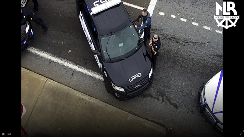 iDrive Arkansas traffic cameras capture apparent standoff between law enforcement and an armed subject. 