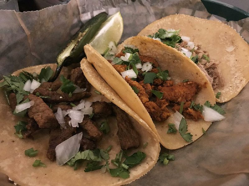 Carne Asada, Al Pastor and Carnitas are a few varieties of street tacos available at Dos Rocas Beer & Tacos in Little Rock. 