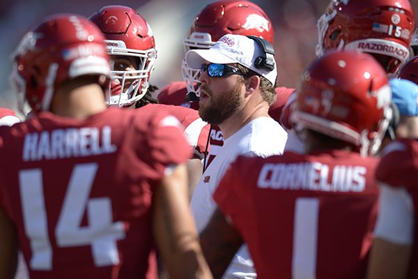 Arkansas offensive line coach Dustin Fry speaks to his players against North Texas Saturday, Sept. 15, 2018, during the second quarter at Razorback Stadium in Fayetteville. 