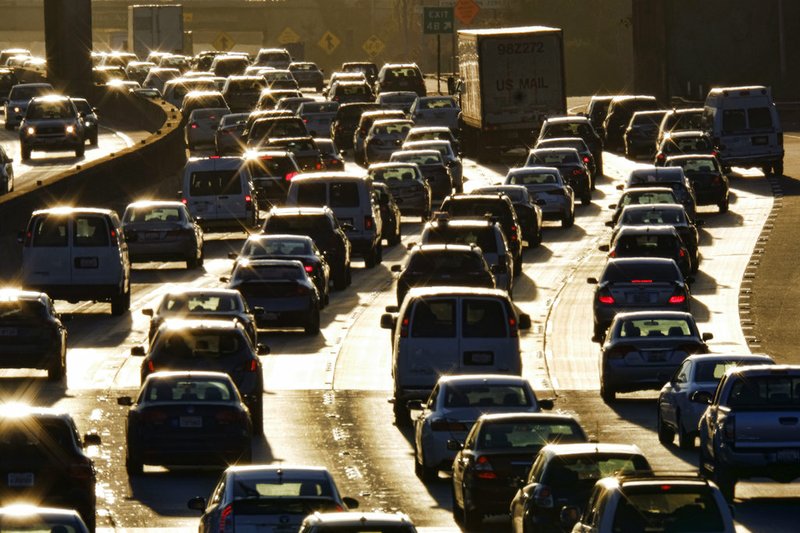 In this Nov. 15, 2016, file photo morning rush hour traffic makes it's way along US 101 near downtown Los Angeles. California's population grew by 215,000 people but is still shy of 40 million, the state announced Friday, Dec. 21, 2018 .(AP Photo/Richard Vogel, File)