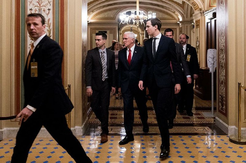 Vice President Mike Pence (center) and White House senior adviser Jared Kushner leave the Capitol on Friday after they and acting chief of staff Mick Mulvaney were unsuccessful in efforts to broker a compromise on border wall funding.