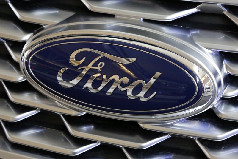 FILE - This Feb. 15, 2018 photo shows a Ford logo on display at the Pittsburgh Auto Show in Pittsburgh. Ford is recalling more than 410,000 F-Series pickup trucks with engine block heaters in the U.S. because they can catch fire.
The recall covers certain F-150s from the 2015 through 2019 model years, as well as the 2017 through 2019 F-250, 350, 450 and 550. The company says in government documents posted Friday, Dec. 21, 2018, that water and contaminants can get into the heater cable and cause corrosion. (AP Photo/Gene J. Puskar)