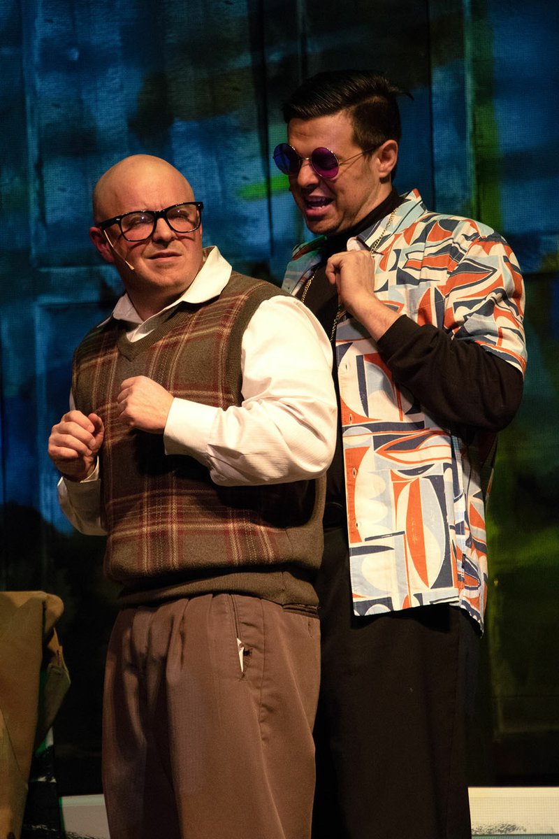 Courtesy Photo A community theater company, Arkansas Public Theatre stretched its mission to premiere Oren Safdie's new script, "Thing to Do in Munich, in November. Kris Isham, left, originated the role of Sheldon, and Tyler Volz, right, played a dozen other characters.