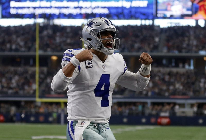 Prescott, Cowboys wrap up NFC East with 27-20 win over Bucs