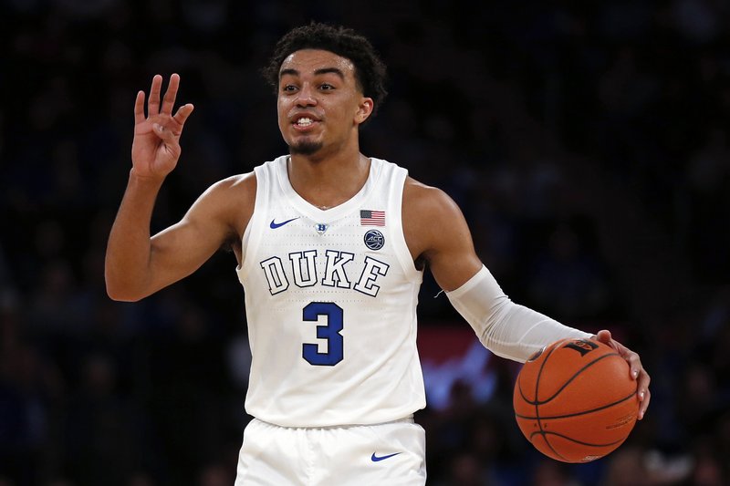 In this Dec. 20, 2018, file photo, Duke guard Tre Jones gestures to teammates during the first half of the team's NCAA college basketball game against Texas Tech in New York. 