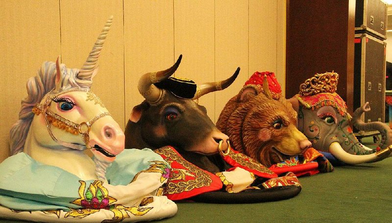 The Great Russian Nutcracker production includes 12-foot puppets — a Spanish bull, an Arabian elephant, a Chinese dragon, a Balalaika-playing Russian bear and a French unicorn — as part of the second-act regional variations in the Land of Peace and Harmony.