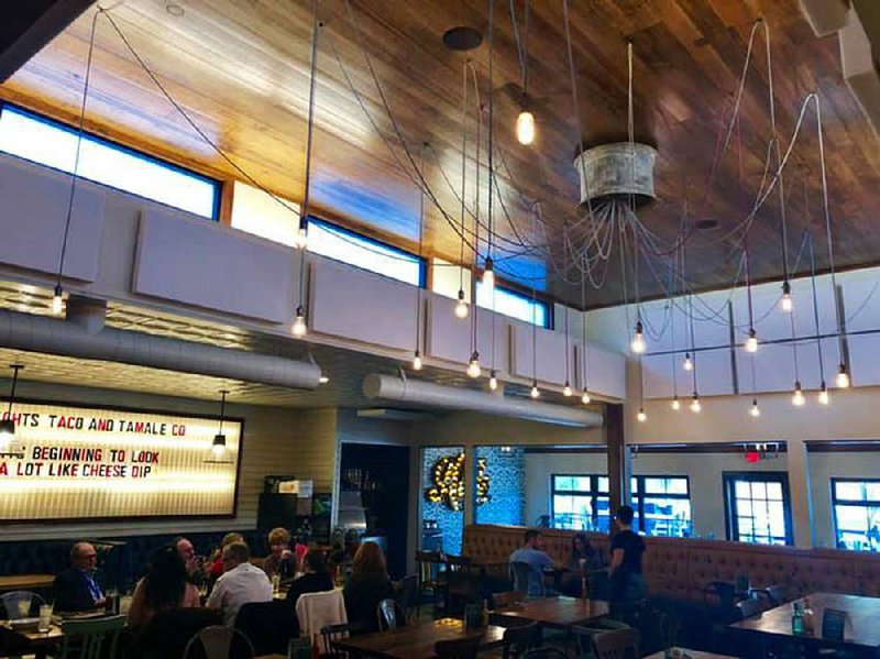 New sound-absorbing panels on the walls of Heights Taco & Tamale will cut down on the noise, something patrons have complained about for years.