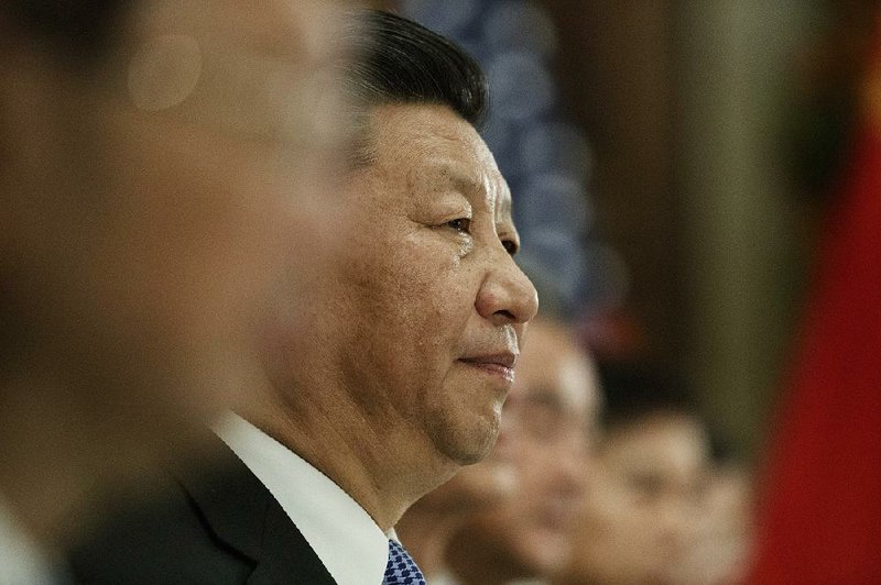 President Xi Jinping of China listens at the G-20 Summit in Buenos Aires, Argentina, on Dec. 1. As millions around the world gathered to celebrate Christmas, China is capping a year in which Xi’s government has led an unrelenting campaign against unofficial churches in China, which by some estimates serve as many as 30 million people. 