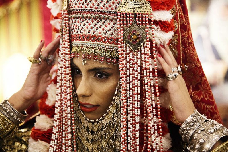 Bride Meyrav Yehud adjusts the final accessories of her henna outfit during a henna ceremony at the Yemeni Heritage Center in Rosh HaAyin, Israel. Pre-wedding henna ceremonies have regained popularity in Israel’s Jewish Yemenite community, an expression of ethnic pride in their heritage and traditions. 