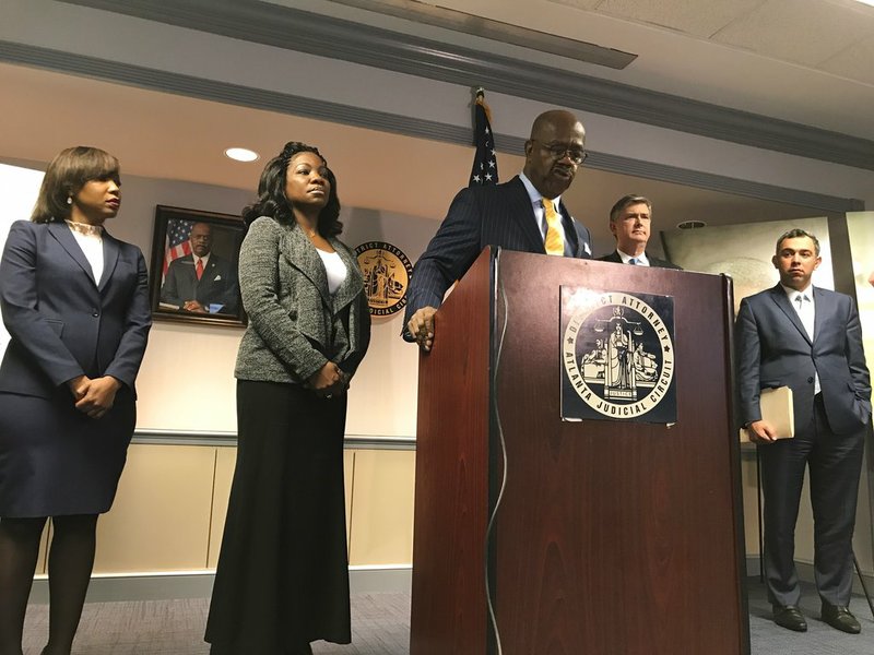 Fulton County District Attorney Paul Howard discusses his attempts to obtain information about the killing of Jamarion Robinson, who was shot 59 times by law enforcement officers, on Friday, Dec. 28, 2018. (AP Photo/Jeff Martin)