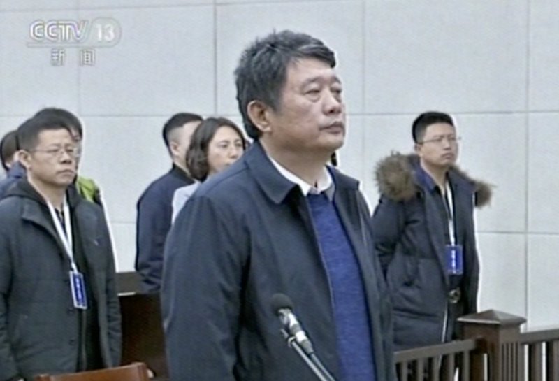 In this image made from Dec. 27, 2018, CCTV video, China's former deputy intelligence chief Ma Jian appears in a courtroom in the northeastern port city of Dalian, China. The court said Ma Jian has been found guilty of crimes including accepting bribes and insider trading. (CCTV via AP)