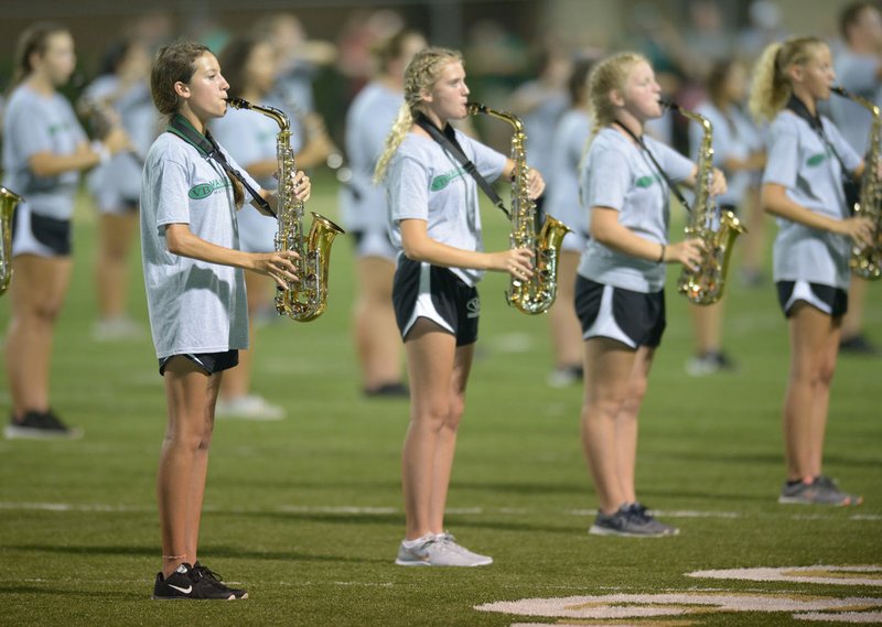 File photo/NWA Democrat-Gazette/ANDY SHUPE Van Buren High School' band performs Aug. 28 during halftime of the Pointers' game with Alma at Airedale Stadium in Alma. Over the past few years, high school marching bands in Arkansas have improved the quality of shows and increased their participation in regional and national competitions.