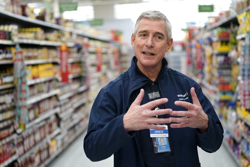 In this Nov. 9, 2018, file photo, Walmart U.S. President and CEO Greg Foran talks about the technology the company is using to keep shelves stocked at a Walmart Supercenter in Houston. He is leaving Walmart to become chief executive officer at Air New Zealand Ltd.