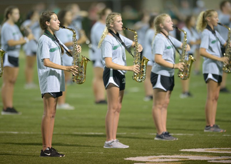 NWA Democrat-Gazette/ANDY SHUPE
Members of the Van Buren band perform Tuesday, Aug. 28, 2018, during halftime of the Pointers' game with Alma at Airedale Stadium in Alma. Over the past few years, high school marching bands in Arkansas have improved the quality of shows and increased their participation in regional and national competitions.