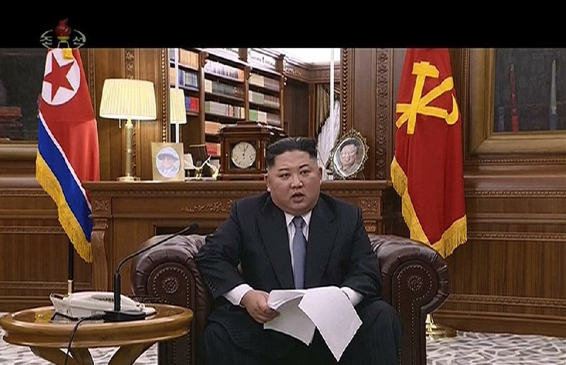 North Korean leader Kim Jong Un delivers a speech in this image distributed today by the state-run broadcaster KRT.