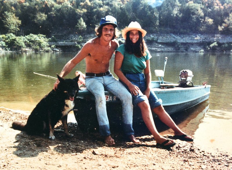 NWA Democrat-Gazette/FLIP PUTTHOFF This couple were on a quest to explore all of the White River lakes. They're shown here in 1978 as they set out on Bull Shoals Lake.