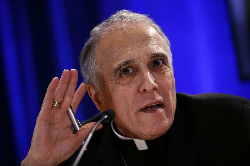 Cardinal Daniel DiNardo, president of the U.S. Conference of Catholic Bishops, listens to a question about a blocked vote on clergy sex abuse during the Catholic group’s November meeting in Baltimore. A letter from the Vatican calls into question DiNardo’s explanation for why the vote was blocked. 