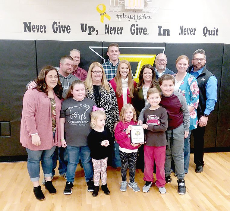 MARK HUMPHREY ENTERPRISE-LEADER Multiple generations, representing the late Coach Ed Staggs, participated as he was inducted into the Prairie Grove Athletic Hall of Pride on Friday, Dec. 7, 2018. Those present included: Kelsi Bartholomew, Madi Bartholomew, Reagan Bartholomew, Riley Staggs, Kolby Staggs, Brady Staggs, Brandon Bartholomew, Tammy Barnes, Whitney Staggs, Jennifer Bartholomew, Christine Staggs, Johnny Barnes, Garrett Staggs, Lance Staggs, and Robert Staggs.